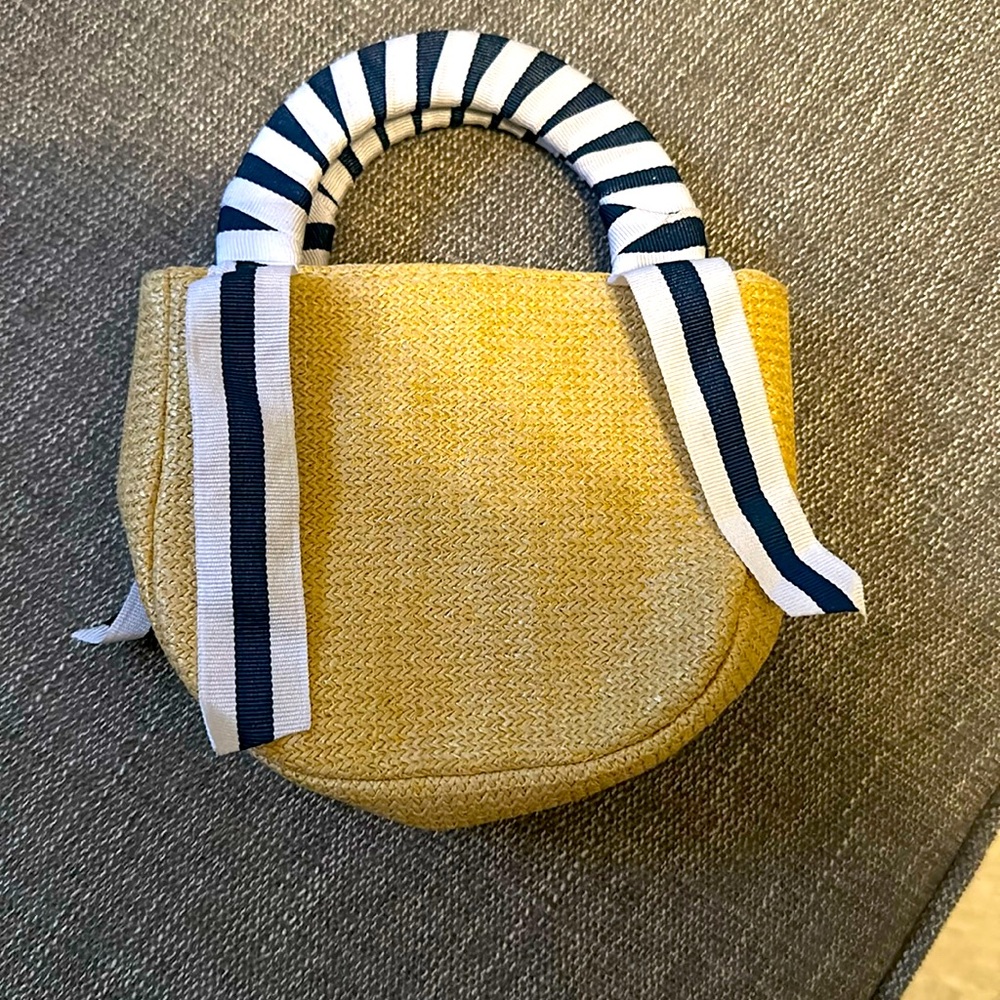 Little girl’s straw purse